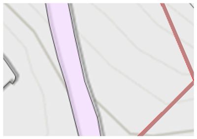Et kartutsnitt som viser topografi (konturlinjer) og en del av en eiendomsgrense.