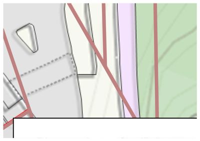 Dette bildet viser en detalj fra et situasjonskart (tomtekart). Det er synlig med tomtegrenser, vei- eller gangveier (røde linjer), og skråheller som indikerer terrengform.