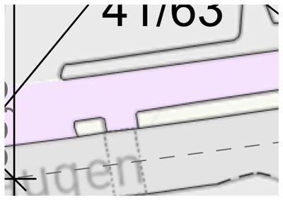 Et detaljutsnitt fra en situasjonsplan som viser eiendomsgrenser, vegger og deler av et tomtenummer (41/63).