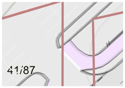 Dette er en detalj fra en situasjonsplan (tomtekart). Bildet viser en del av en tomt med en bygningsfot (konturene), en vei eller gangvei (lilla feltet), og tomtenummeret '41/87'.
