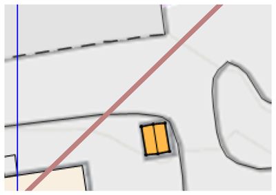 Et kartutsnitt som viser en del av et nabolag med en gulmarkert bygning, en rød linje (sannsynligvis en vei eller grense), og en blå linje.