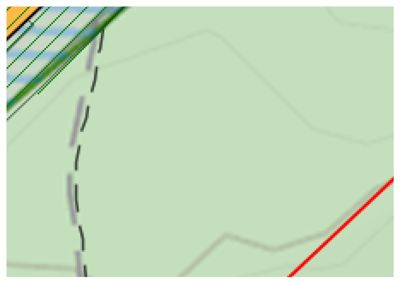 Et kartutsnitt som viser topografi (konturlinjer) og en del av en vei eller grense.