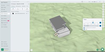 Et skjermbilde av et 3D-modellprogram (Placepoint) som viser en digital 3D-modell av en bygning på et terreng. Bildet inneholder også brukergrensesnitt-elementer som menyer, verktøylinjer og en dialogbokse for 'Daglys'.