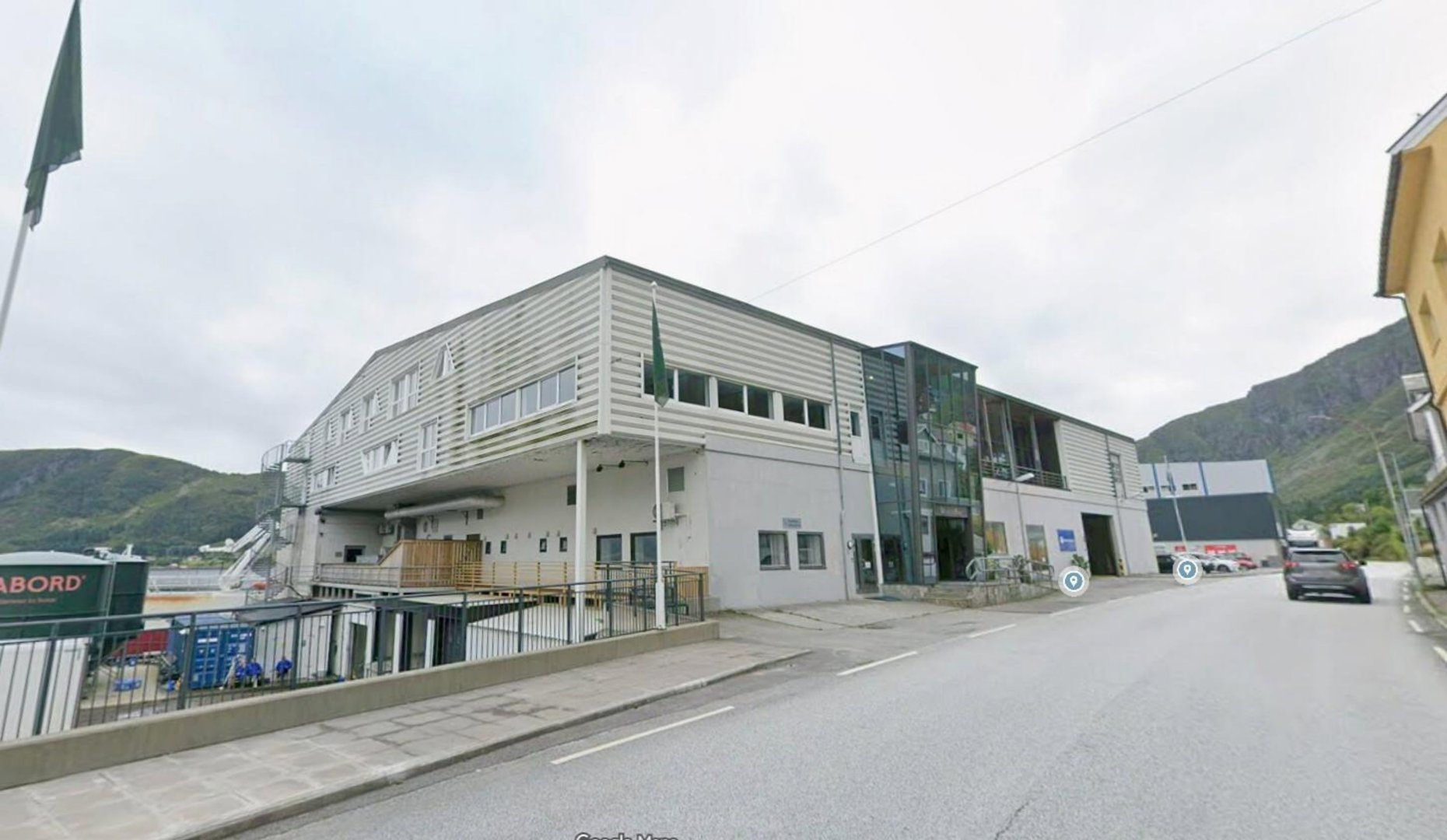 Fotografi av en eksisterende bygning sett fra gaten, sannsynligvis tatt fra Google Street View.