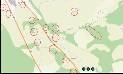 Kart over et område med veier, terreng og flere markerte punkter (muligens eiendommer eller bygninger).