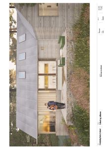 Fotografi av en ferdig eller planlagt villa med utsikt mot fasaden og hagen.