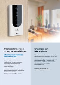 Et fotografi som viser et trådløst alarmsystem montert på en vegg, med en uskarpt bakgrunn av et interiør.