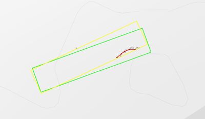 Situasjonsplan som viser tomtens form (grønn) og bygningens plassering (gul), med en rød linje som antageligvis viser en vei eller grense.