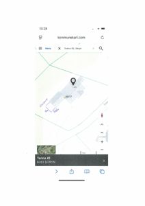 Kart fra kommunekart.com som viser eiendommen Tenna 45 i Stryn, med bygningsfot og målestokk.