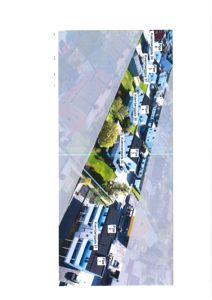 Fotografi av en rekkehusbebyggelse med adressebeskrivelse (Kvæmberggata) og husnummer.