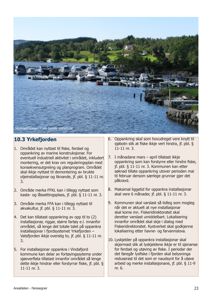 Fotografi av Vatsfjorden med båter og bygninger langs kysten.