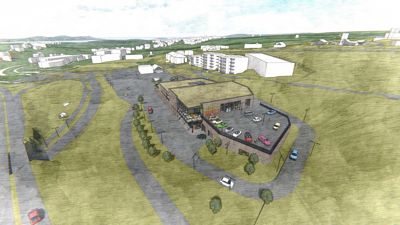 3D-visualisering (rendering) av et nytt bygg i et nabolag, sett fra en høyde.