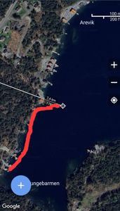 Satellittbilde (kart) med en rutenotering og avstandsmåling.