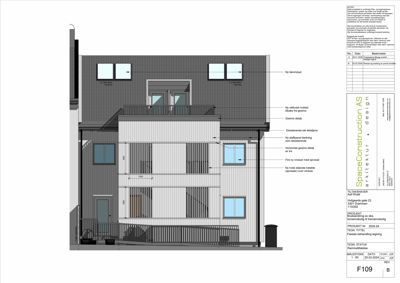 Fasadetegning som viser fronten av en bygning med detaljer om materialer og vinduer.