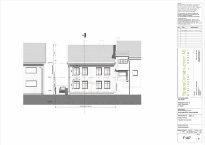 Fasadetegning som viser bygningens utseende sett fra forfra, med mål og detaljer.