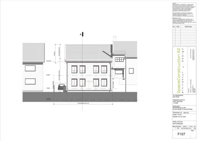 Fasadetegning som viser bygningens utseende sett fra fronten, med mål og detaljer.