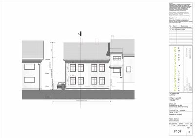 Fasadetegning som viser bygningens utseende fra forsiden med mål og detaljer.