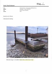 Fotografi av en kai eller brygge ved vannet, tatt i dag kl 0930.