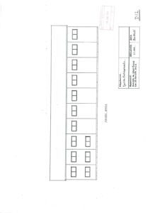 Fasadetegning som viser bygningens utvendige profil med vinduer og etasjer.