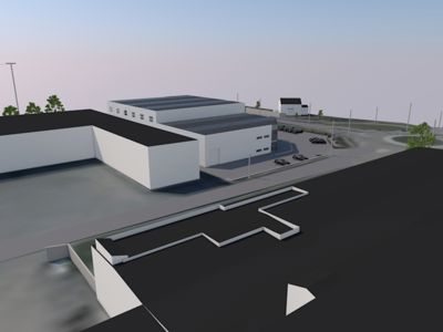 3D-visualisering av en industriell eller lagerbygning sett fra et vinklet perspektiv, inkludert omgivelser som parkeringsplasser og veier.