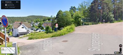 Google Street View-bilde som viser en gate og nabolag.