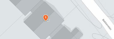 Kart med en markør som viser en bygning, og en gatenavn 'Bekkerveien'.