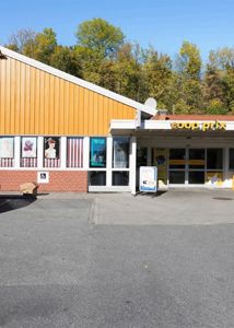 Fotografi av fasaden på en Coop Prix-butikk.