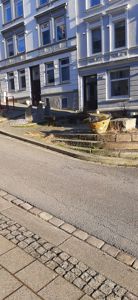 Fotografi av fasaden på en eksisterende bygning sett fra gaten.