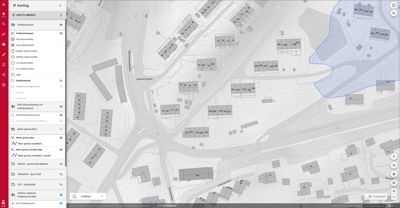 Et digitalt kart (Kartlag) som viser et nabolag med bygninger, veier og en markert blå soner.