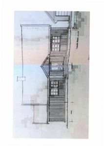 Fasadetegning (opprikk) av en bygning sett fra nord.