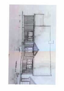 Fasadetegning (opprikk) av en bygning sett fra nord.