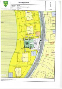 Situasjonskart som viser eiendommen 96/425 med adresse Torger Behnsdatens veg 15A, inkludert naboeiendommer, vegforhold, støttemur og mål på eiendomsgrunnlinjer.