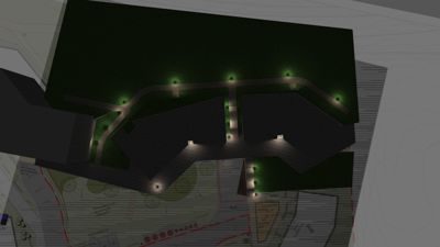 En 3D-visualisering (rendering) av et byggeprosjekt sett fra oven. Bildet viser en mørk, nattlig scene med lyspunkter langs stier og rundt bygninger, som illustrerer hvordan lyset vil falle i det ferdige prosjektet.