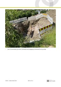 Fotografi av gravearbeid på en tomt med en hvit gjerde rundt graven.