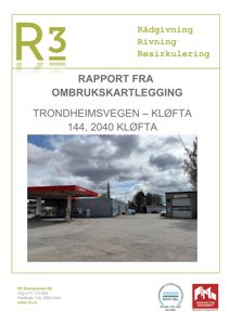 Fotografi av en eksisterende bensinstasjon og tilhørende bygninger.