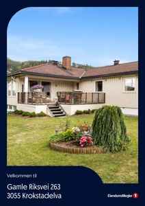 Fotografi av en enebolig med hage og omgivelser.