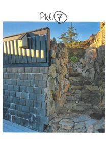 Fotografi av en steinmur og trapp i en bygningssituasjon