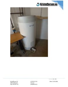 Fotografi av en varmtvannstank i et rom.