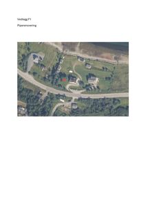 Flyfoto av et boligområde med en markert tomt (rødt punkt) og omgivende infrastruktur.