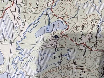 Et topografisk kart som viser terrengform, vannveier, veier og stednavn i et norsk område.