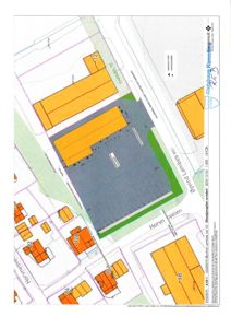 Situasjonsplan som viser tomt, bygninger og veier i et byområde.