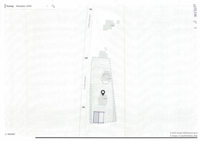 Et digitalt kart (Norkart) som viser en tomt med bygningsplasseringer, gater og høydemål.