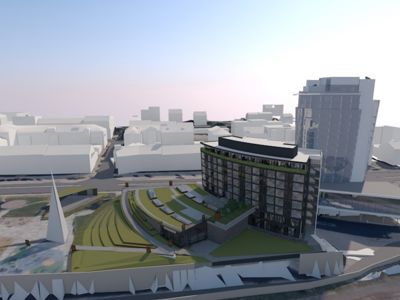 3D-visualisering av et nytt byggprosjekt med omgivende landskap og nabobygninger.