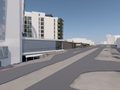 3D-visualisering av en planlagt bygning med omgivende infrastruktur sett fra gatens perspektiv.
