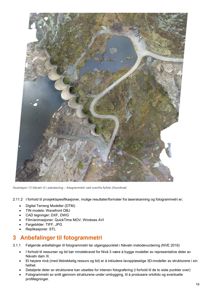 Fotografi av en dam og vannkraftverk sett fra lufta (flyfoto).