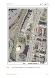 Flyfoto av Parkhalltaket og «Høkjeften» med omgivende infrastruktur, inkludert veier, jernbanespor og nabolag.