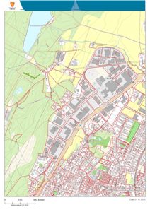 Et kart over en bydel (Førde kommune) med overlag av arealbruksplanlegging, der ulike soner er markert med farger og røde linjer.