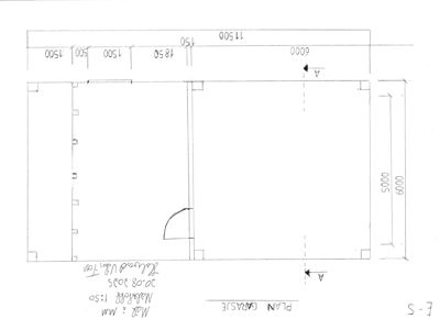 Plantegning av en garasje med angitte mål og romfordeling.