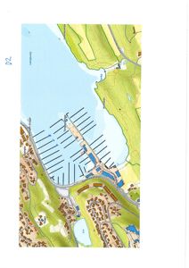 Et kart som viser et havneområde med brygger, veier og bebyggelse.