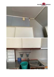 Fotografi av en kjøkkenområde med synlig vask, benkplate og skap.